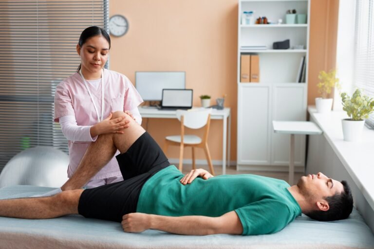 Physiotherapist assessing knee pain