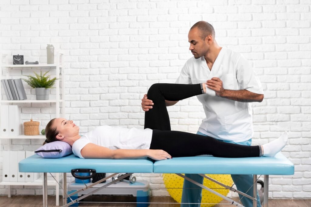 Knee rehabilitation physiotherapy on a treatment table